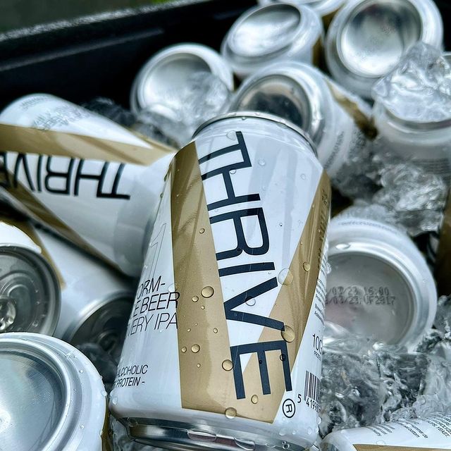 Thrive recovery beer cans in icewater