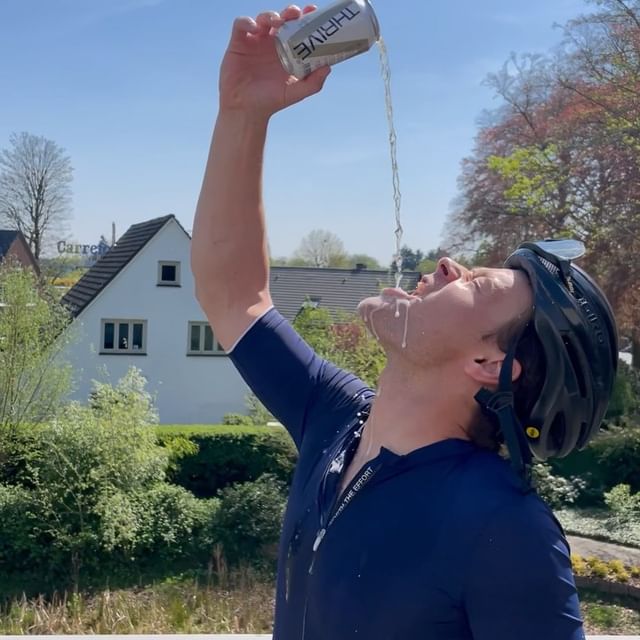 Our founder drinking from a Thrive beer can